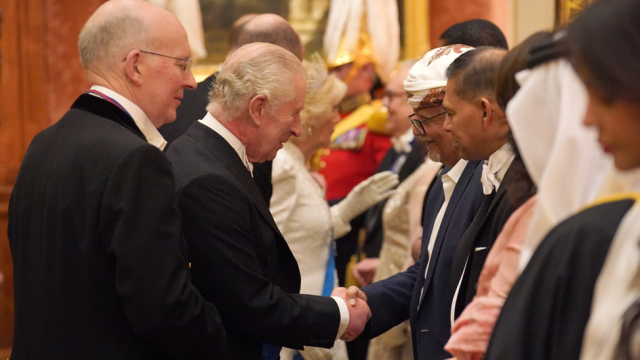 Royal couples pose for a 'show of unity' photo.